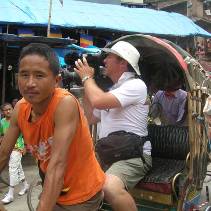 Beyond Cameraman West Ashton takes time with the camera from a rickshaw, for National Geographic Channel, 2008